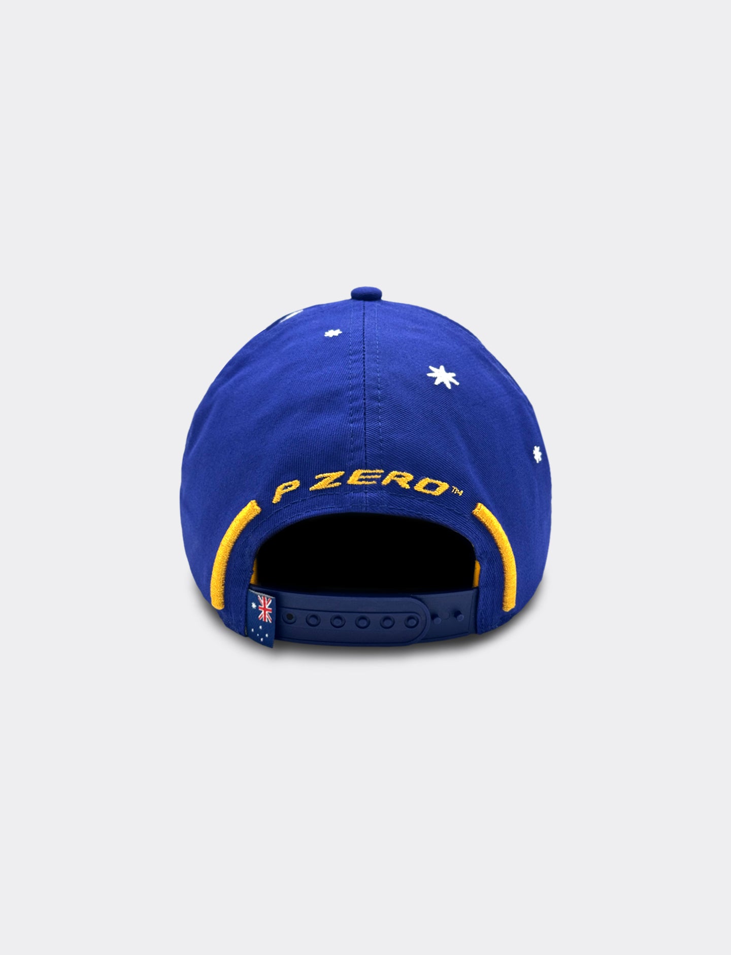 Blue Pirelli Podium Cap with yellow accents on a light gray background