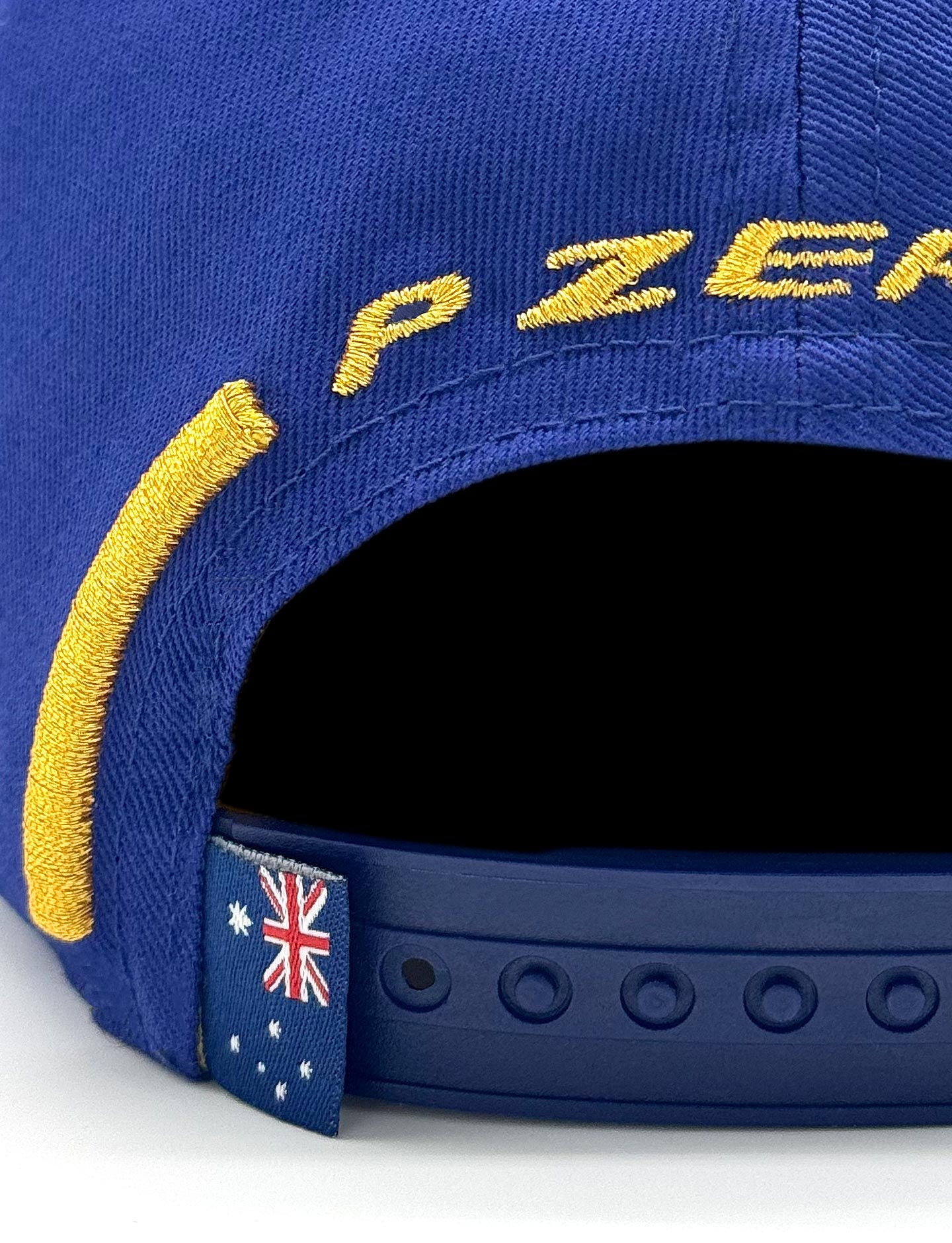 Blue Pirelli cap closeup of Australian flag and P Zero embroidery