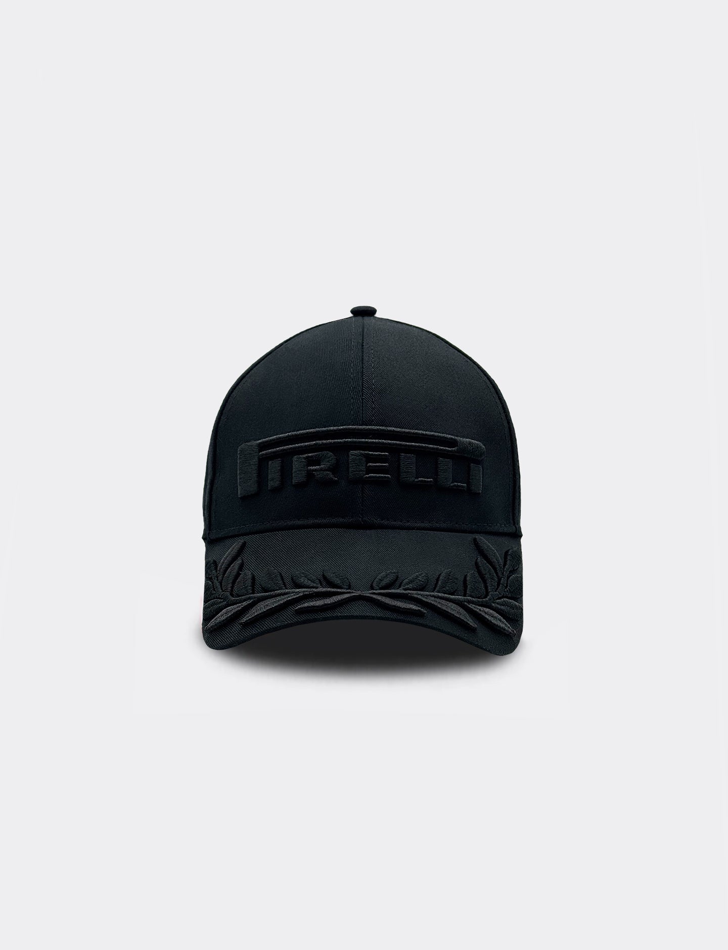 Black cap with a Pirelli logo on a light gray background