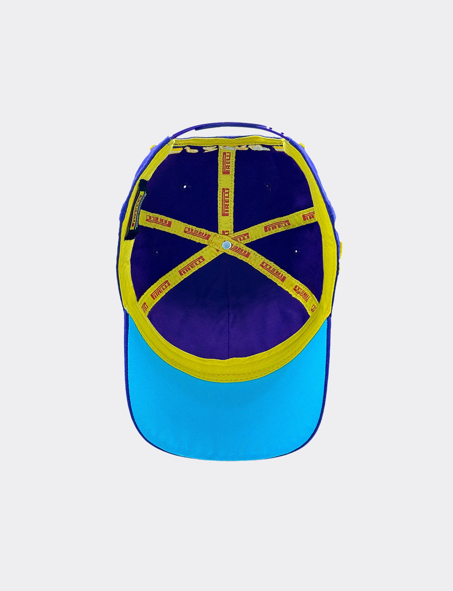 Purple Pirelli cap with yellow details and red text on a white background