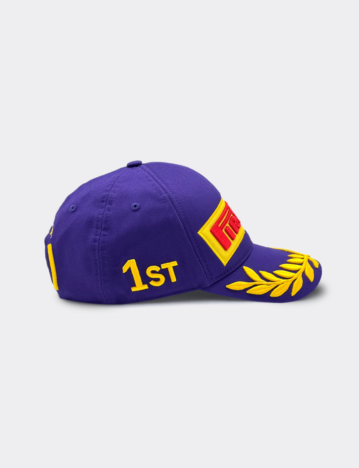 Purple F1 Academy cap on a light gray background