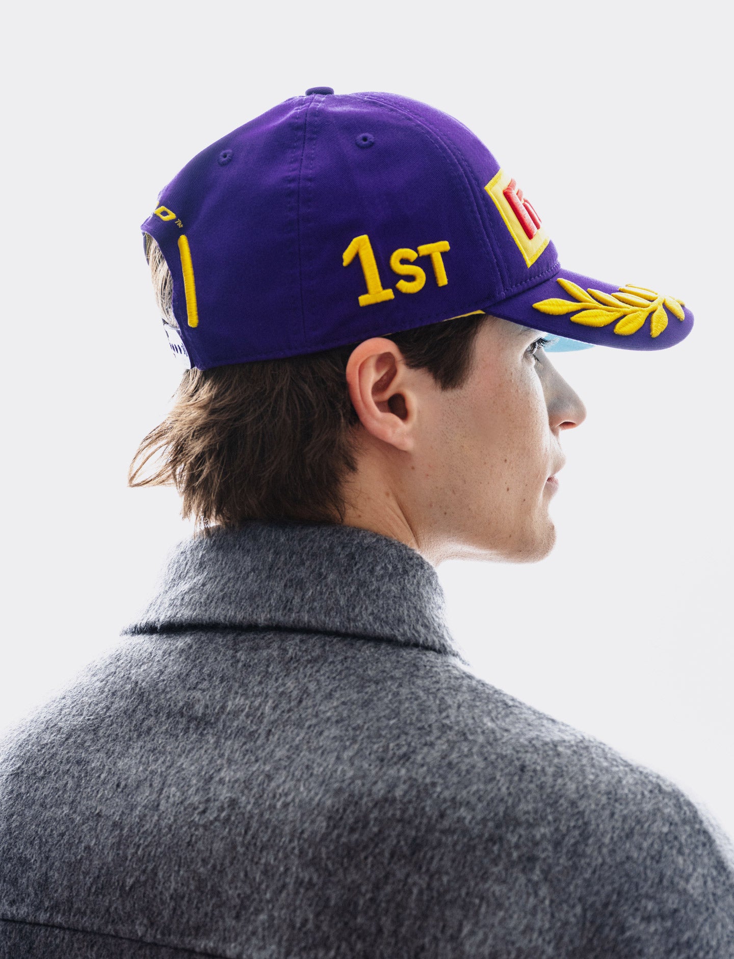 back side view of purple Pirelli cap