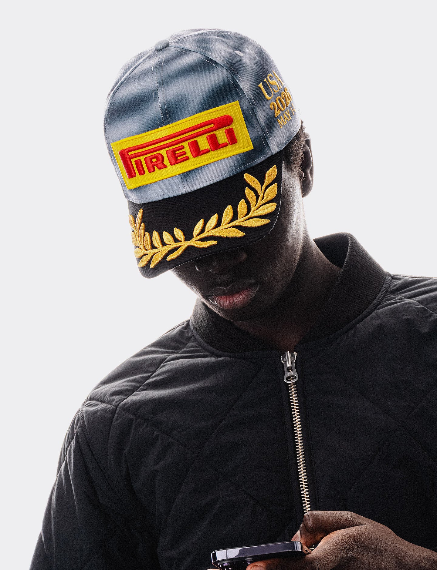 Person wearing the official Miami F1® 2026 Pirelli Podium Cap