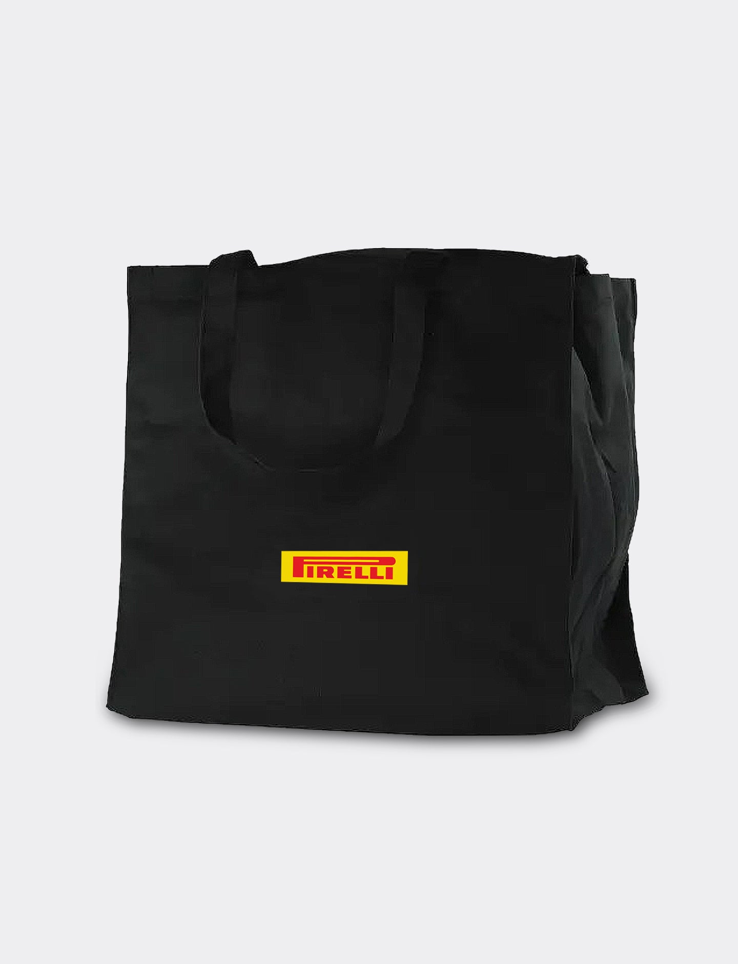 Black tote bag with Pirelli logo on a light gray background