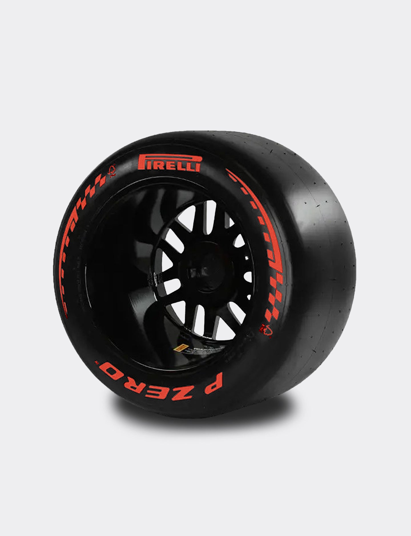 Black tire with red lettering on a gray background